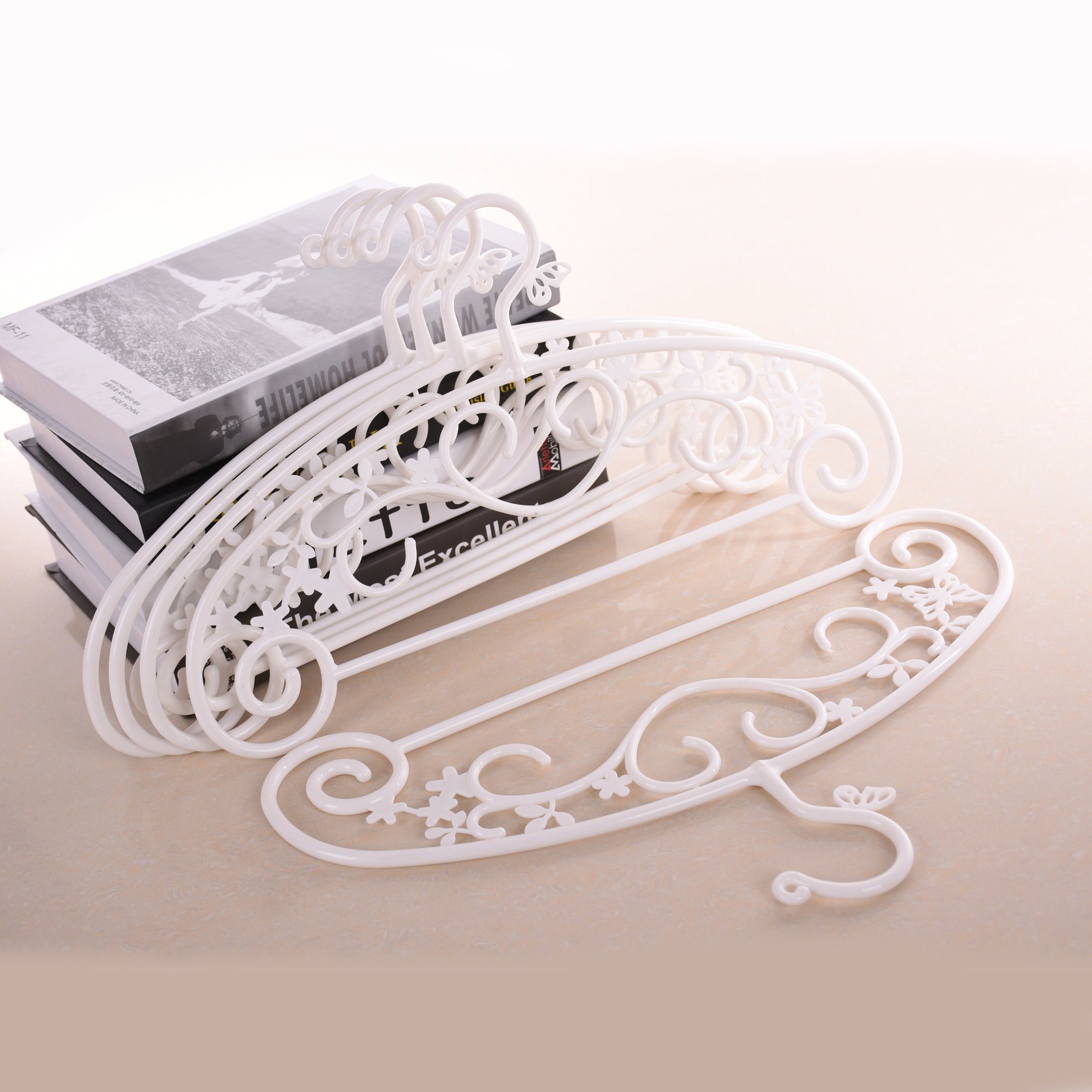 Women Apply White Elegant Plastic Hanger